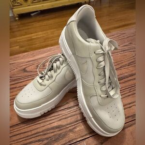 Nike Air Force 1 Pixel “Light Stone” women’s sneaker.